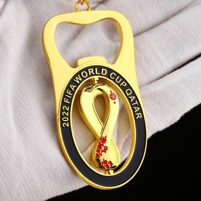 China 2022 Durable Katar World Cup Alloy Bottle Opener Titan Cup Beer Opener Pendant Key Chain Removable Functional Key Chain for sale