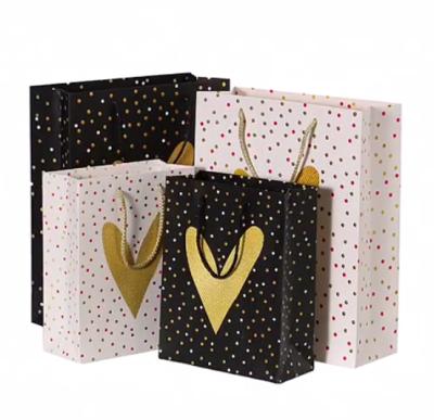 China Recycled Materials OEM Custom Paper Bag Wholesale Customized Luxury Shopping Paper Gift Bags for sale