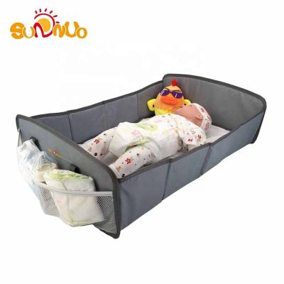 China Durable portable foldable travel bed for baby works as a crib and diaper bag changing station for sale