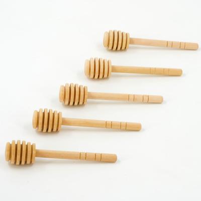 China Hot Sale Viable Custom Design Multiple Sizes Honey Spoon Wooden Honey Stick Natural Dipper for sale