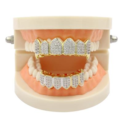 China Hiphop Fashion Punk 18k Gold Plated Teeth Jewelry Diamond Drill Teeth Grillz Body Jewelery For Christmas Gift for sale