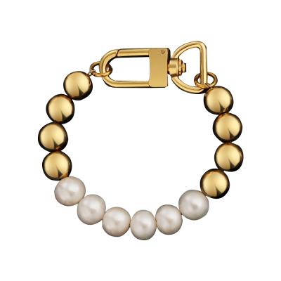 China Hiphop 14k Solid Gold Big AAA Baroque Hawaiian Rice Beads Jewelry Charm Bracelets 316L Stretch Freshwater Pearl Steel Bracelets for sale