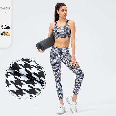 China Yoga Stretch Houndstooth Plaid Pants Fitness Sports Plaid Breathable Hot Sale Sports Hip-Lifting Tight Set for sale