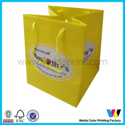 China Yellow Custom Printed Paper Bags With Glossy Lamination PP String for sale