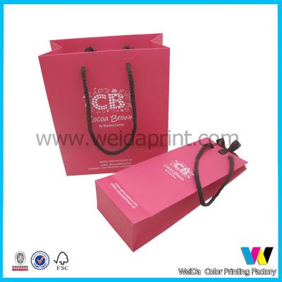 China Pink Fashionalbe Printed Paper Shopping Bags , Packaging Bag With Bowknot for sale