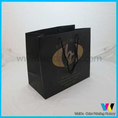 China Recycled shopping Black Cosmetic 230g art Paper Gift Bags with PP cord for sale