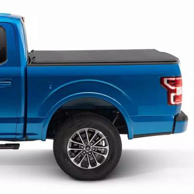 China Retractable Tonneau Roll Cover New Style Custom Aluminum Alloy Soft Folding Waterproof Black Triple Soft Cover For Toyota Hilux for sale