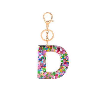 China New Key Chain Love Sequins Letter Key Chain Stain Resin Glue Fashion Pendant Men and Women Bag Crystal Acrylic Letter Keychain Pendant for sale