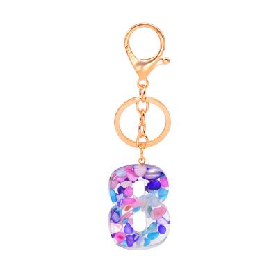 China Crystal Environmental Protection Resin Jewelry Isa Acrylic Transparent Key Key Chain Stone Men And Women Key Chain Digital Resin Model for sale