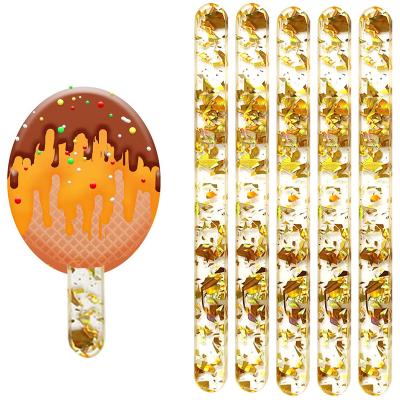 China Viable Gold Glittery High Quality Clear Acrylic Ice Cream Sticks Popsicle Stick Kids Openers DIY Crafts Handmade Baby Shower Kids for sale