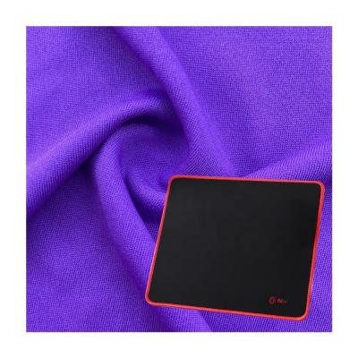 Chine 100% polyester pour un seul maillot 4 voies étirement polyester revêtement de tissu 75D pour le pad de souris à vendre