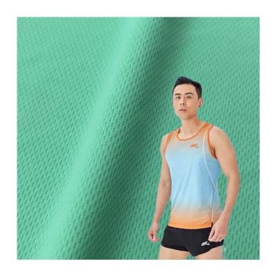 Cina Poliestere blu scuro occhio d'uccello maglia occhio maglia maglietta tessuto 140-160gm per abbigliamento sportivo in vendita