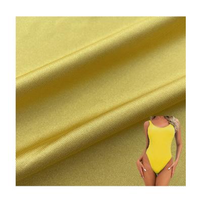 China 4 Way Spandex Lycra Texturizado Tejido de trajes de baño a medida Brillante a prueba de agua en venta