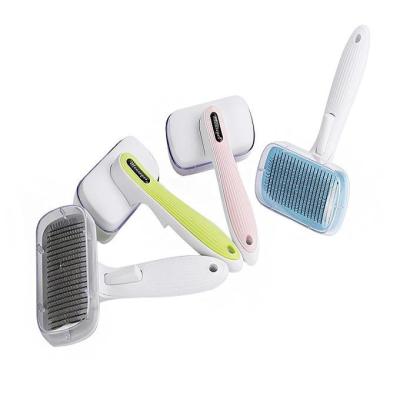 China Stored Pet Supplies Automatic Pet Comb Hair Remover Brush Cat Dog Grooming Tools for sale