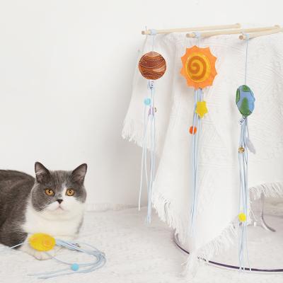 China Colorful Earth Stocked Cat Teaser Wand Sun Moon Saturn Shape Natural Wooden Stick Canvas With Catnip Pet Interactive Toys for sale