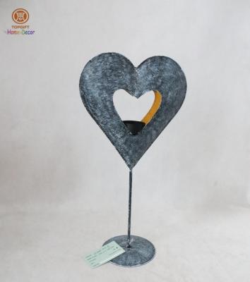 China Heart shape metal candle holder with goldleaf covered inside Stand design for sale