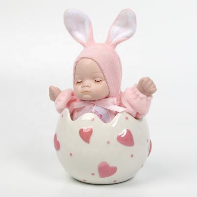 China Music Box Gifts Baby Modeling Porcelain Dolls Wind Up Music Toys for sale