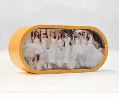 China Simple fashion simple style the rounded rectangle music box photo frame wooden keepsake for sale