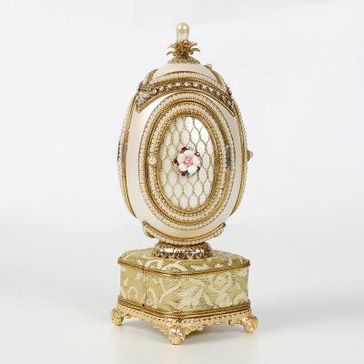 China Music box made of exquisite egg carving hot sale decorated fancy goose egg carving music box jewel box for sale