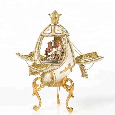 China Music box made of exquisite egg carving decorated fancy hand engraving goose egg carving music box for sale