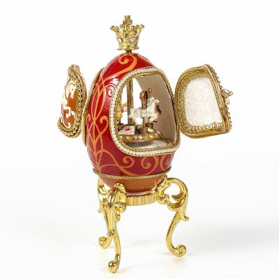 China Music box made of joyful egg exquisite carving go round goose egg carving music box jewelry box for sale