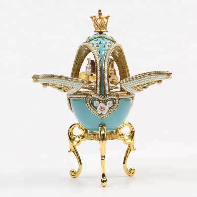 China Rendering of the exquisite egg carving full of gorgeous goose egg carving carousel horse music box for sale