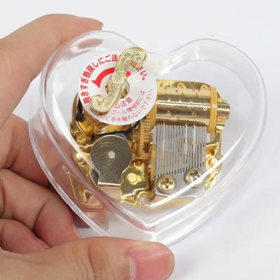 China Have A Wide Market 2019 Heart Shape Sankyo Motion Acrylic Music Box for sale