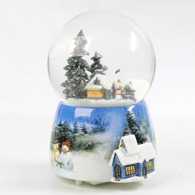 China A crystal ball that spins and glows new style glass snowball christmas gift cogs music box for sale