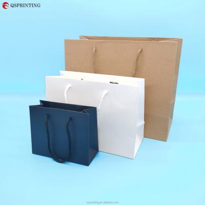 China Recycled Materials Customization Christmas Kraft Paper On Demand Gift Bags Premium Brown Bags With Custom Handles for sale