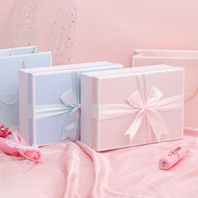 China Custom Luxury Disposable Personality Cardboard Packaging Box With Ribbon Clothes Cardboard Photo Frame Notebook Packaging Gift Box for sale