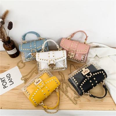 China Hotsale fashion rivets messenger Bag Chain Shoulder bag female rivets square PVC handbag transparent clear jelly bag for sale