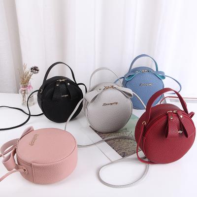 China Fashion Casual Cute Round Bags PU Leather Cross - Body Mini Makeup Round Handbags Shoulder Bag For Women Ladies for sale