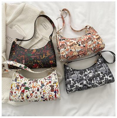 China New fashion designer Summer Fall Doodle graffiti cartoon printing bags women armpit shoulder bags for sale