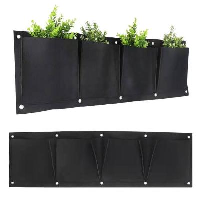 China Durable Non Woven Wall Decoration Hanging Vertical Grow Bags Ruled Hanging Planter Grow Bags With Pockets for sale