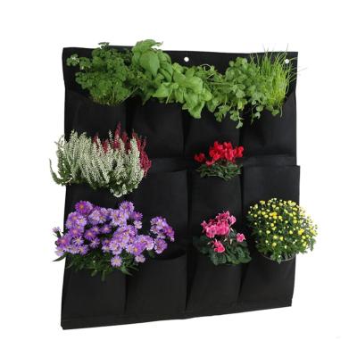 China Durable Horticultural Pockets Vertical Garden Held Planters Grow Bags Wall Vertical Plant Grow Bags With Pockets for sale