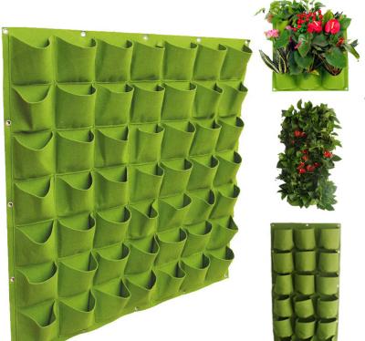 China Durable Eco Friendly Fruit Vegetable Nursery Garden Planter Vertical Grow Bags With Pockets For Greenhouse for sale