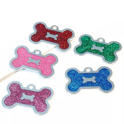 China Wholesale Quick Release Cats Dog Tags Glitter Zinc Alloy Bone Shape Laser Engraved Pets Tag Pet Accessories for sale