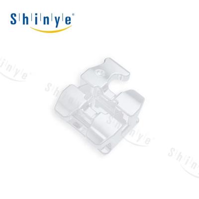 China Polycrystal 0.022 / 0.018 Orthodontic Ceramic Roth Brace Bondable Brackets With 3 Mesh Base With Hook /345 With Hook for sale