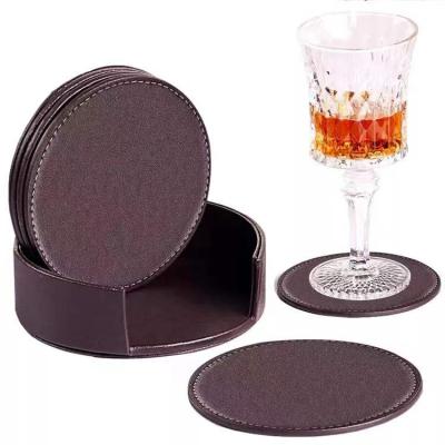 China Sustainable Cup Mat Pad Protect Furniture Coffee or Tea Coasters For Drinks Leather Coasters With Stand for sale