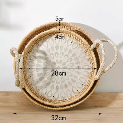 China Viable New Design Rattan Bohemian Plating Basket Shell Ornaments Picnic Pizza Fruit Decorative Around Tray With Handles for sale