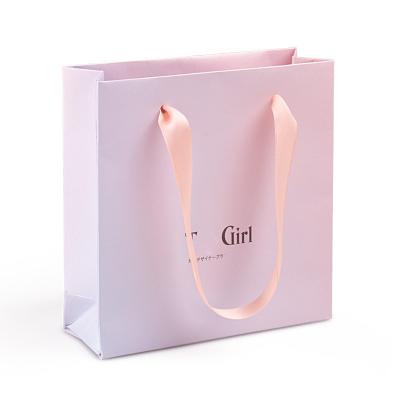 China Recyclable / Biodegradable Sustainable Tote Shopping Cheap Paper Bag With Ribbon Handle Paper for sale