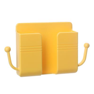 China High quality yellow wall mounted various storage box mobile phone charging stand and battery bracket with wall mounted for sale