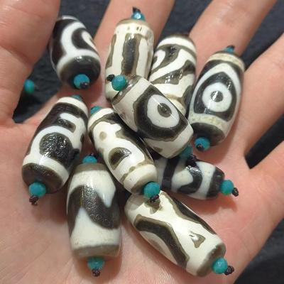 China 1pcs/lot rare weathered surfaced amulet multi-pattern breeds stone 1pcs/lot natural old dzi agate accessories horseshoe jewelry for sale