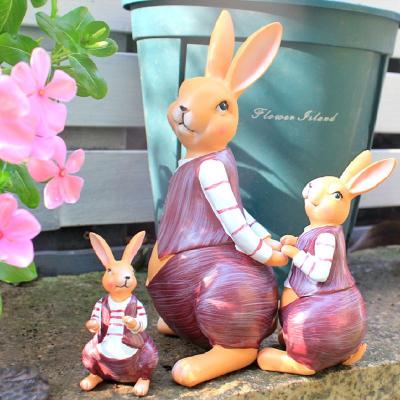 China 2022 Wholesale Lovely Resin Easter Bunny Animal Sculpture Garden Statue Hanging Home Decoration Glass Vase For Home Decoration for sale