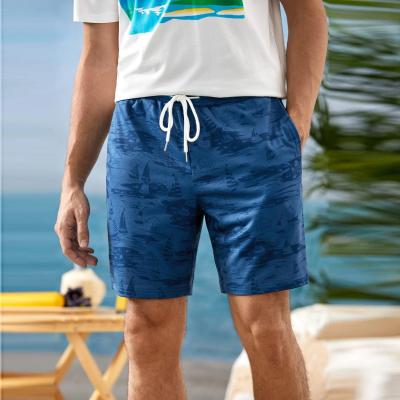 China Anti-Wrinkle XXL Summer Vacation Beach Walk Shorts With Oblique Waist Quick Dry Elastic Polyester Drawstring Pockets Graphic Print Shorts Men for sale