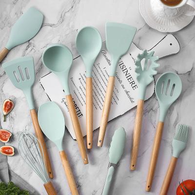 China Stocked Kitchen Cooking Set Wooden Handles Spoon Utensils Silicone Non-Toxic Kitchenware Handles BPA Free for sale