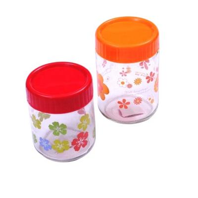 China Sustainable glass jar with colored plastic lid for sale