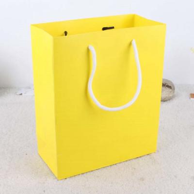 China Brand Handmade Recyclable Paper Packaging Bags Custom Tote Paper Bag For Clothes for sale