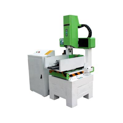 China Hotels CNC Router 6090 Jade Stone Aluminum Steel Engraving 3d Cutting Machine CNC Grave Stone Engraving Machine for sale