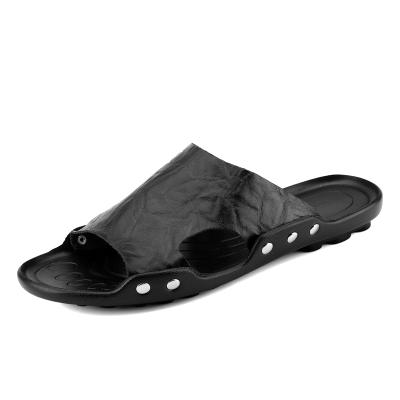 China Anti-odor men and women summer tide rivet leather palm slippers for sale